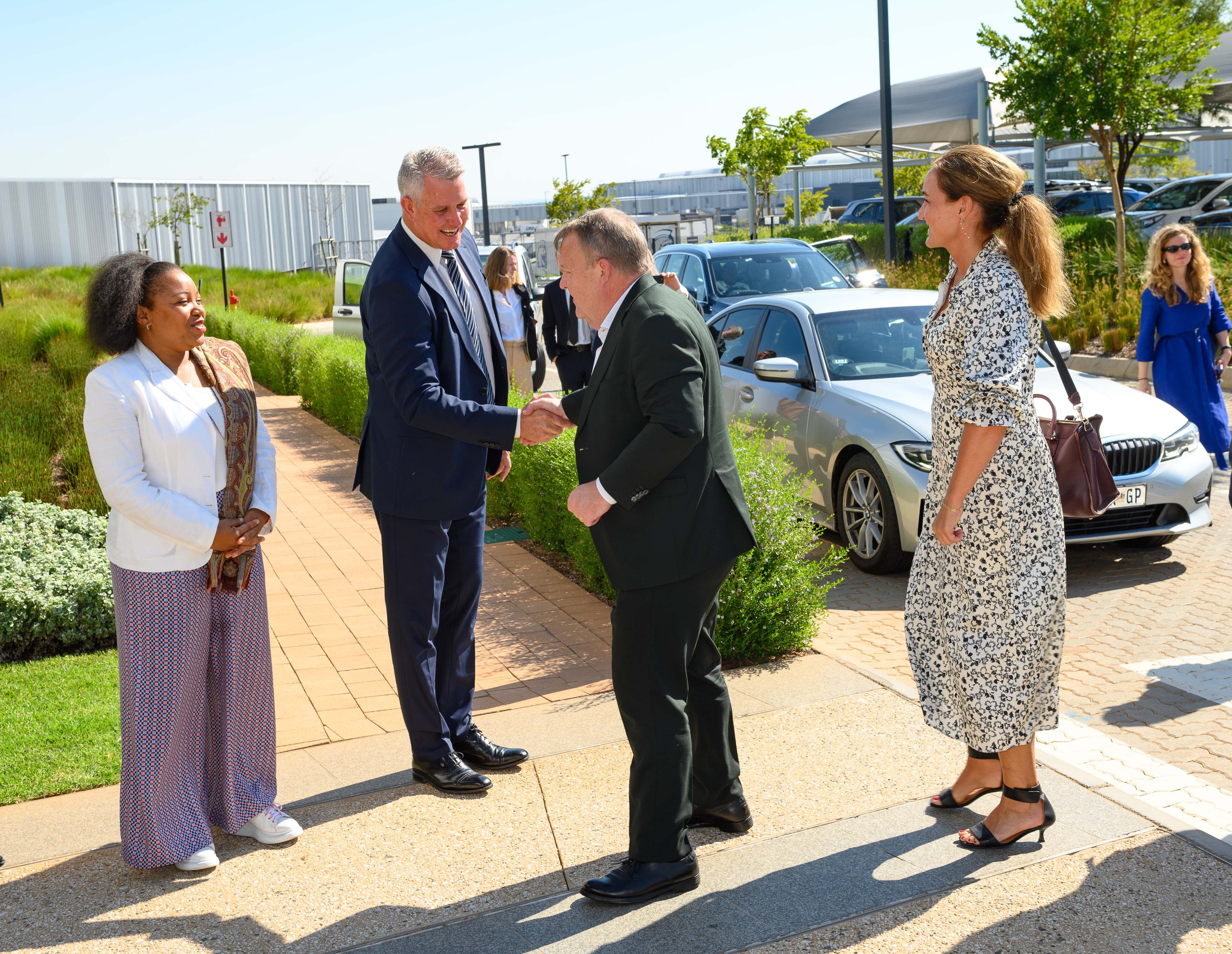 Minister of Foreign Affairs Lars Løkke Rasmussen and Managing Director Anthony Diack Shaking Hands Outside DSV Offices in South Africa